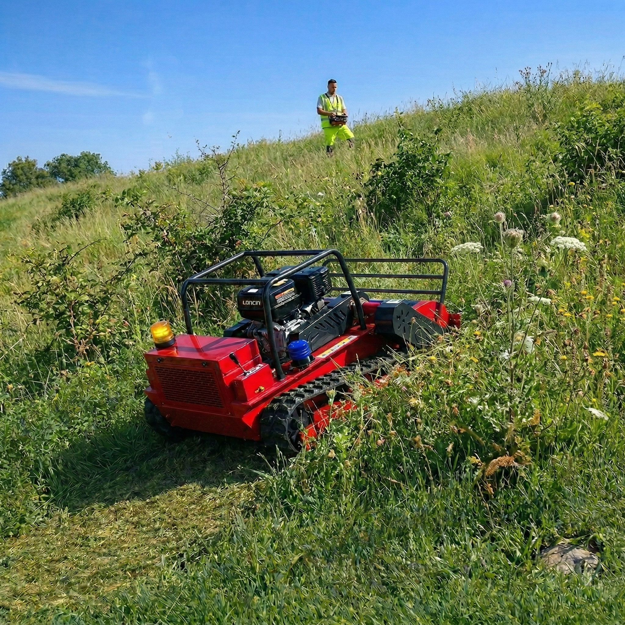 GREEN SHINE GST-1000 remote-controlled tracked flail mower working on a maintained slope